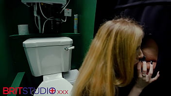 Horny nurse sucks cock at the gloryhole