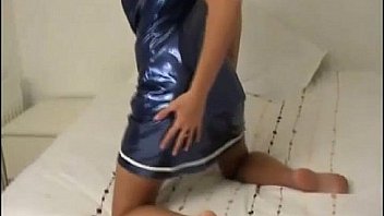 Kiera in shiny red pvc lingerie and heels