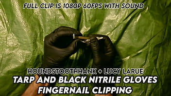 Tarp and black nitrile gloves fingernail clipping