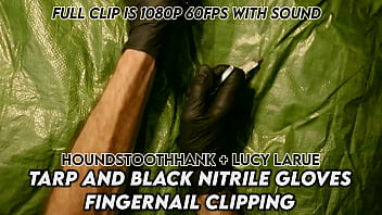 Tarp and black nitrile gloves fingernail clipping