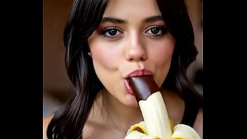 Wednesday addams playing with the banana