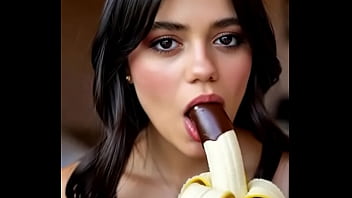 Wednesday addams playing with the banana