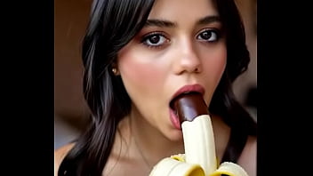 Wednesday addams playing with the banana