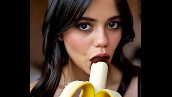 Wednesday addams playing with the banana