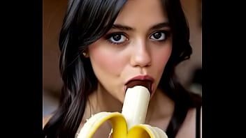 Wednesday addams playing with the banana