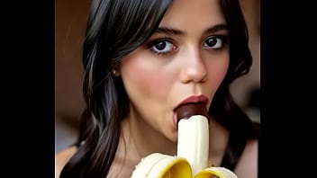 Wednesday addams playing with the banana