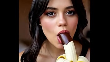 Wednesday addams playing with the banana