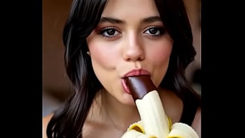 Wednesday addams playing with the banana