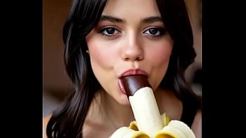 Wednesday addams playing with the banana