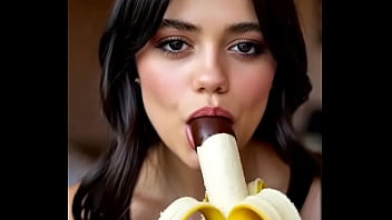 Wednesday addams playing with the banana