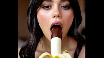 Wednesday addams playing with the banana