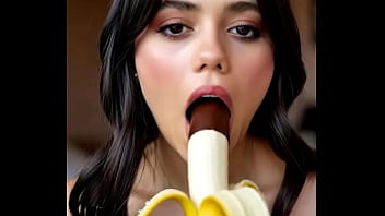 Wednesday addams playing with the banana