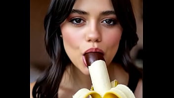 Wednesday addams playing with the banana