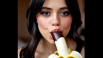 Wednesday addams playing with the banana