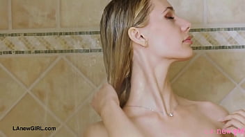 Girl next door blonde enjoys a sensual bath