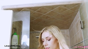 Girl next door blonde enjoys a sensual bath