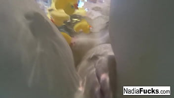 Blonde babe gets wet