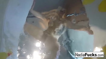 Blonde babe gets wet
