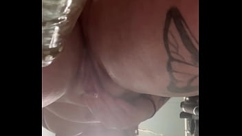 Slut rubs juicy clit down