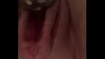 Slut rubs juicy clit down