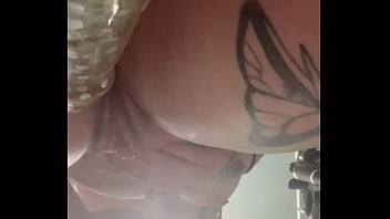 Slut rubs juicy clit down