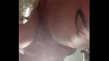 Slut rubs juicy clit down