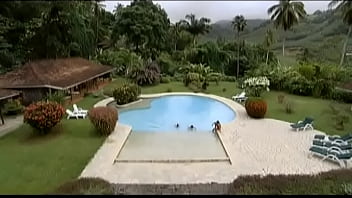 Donna is on vacation in a tropical setting and having a threesome