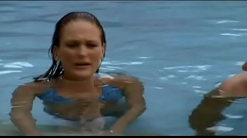 Donna is on vacation in a tropical setting and having a threesome