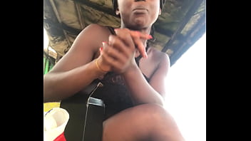 Crazybitch unlocking a package received from kikuu at the beach