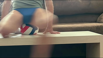 On The Table In Tight Briefs With Volleyball For Muscle Compression And Myofascial Unwinding Clips thumbnail