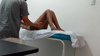 The doctor gives special attention and sensual massage to his female patient