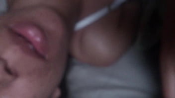 Sucking off his friend while lying down while his husband films