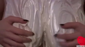 Blonde siri covers her big perfect tits with a lot of lotion