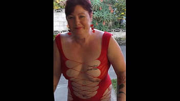 Public kiwi slutty bitch carries out the rubbish wearing red fishnet mini dress in full view