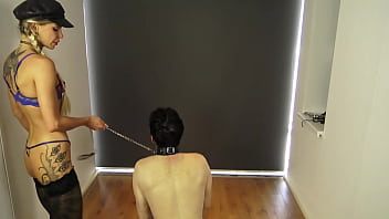 Lady shirley dominate her slave with kicking and spank him with different tools