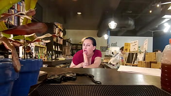 A pretty lady in a red dress sucks and fucks a big dildo titlob blowjob