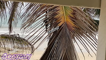 Ebony wife flashes pussy at a beach house