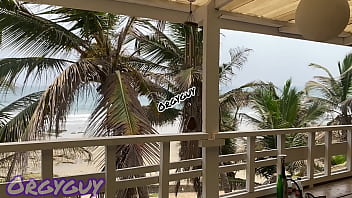 Ebony wife flashes pussy at a beach house