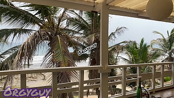 Ebony wife flashes pussy at a beach house