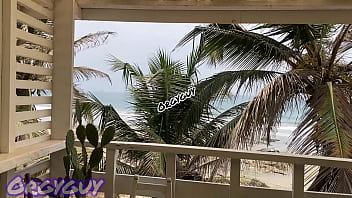 Ebony wife flashes pussy at a beach house