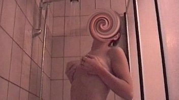 Cute teen takes a shower