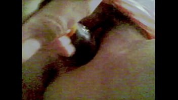 Mexicana metiendose botella