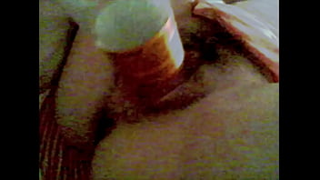 Mexicana metiendose botella