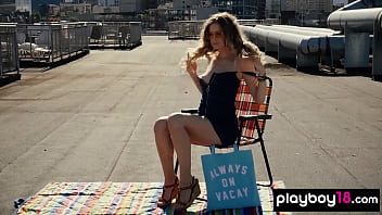 Skinny milf blondie posing naked on the rooftop for playboy