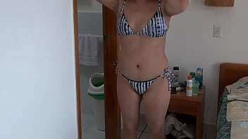 On the beach my stepmom in a bikini shows me her hairy pussy ass and tits