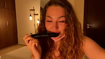 A dildo in the mouth