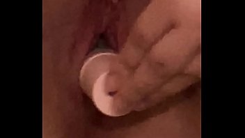 Young girl moans while fucking herself