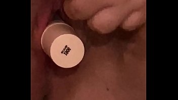 Young girl moans while fucking herself