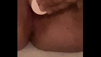 Young girl moans while fucking herself