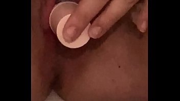 Young girl moans while fucking herself